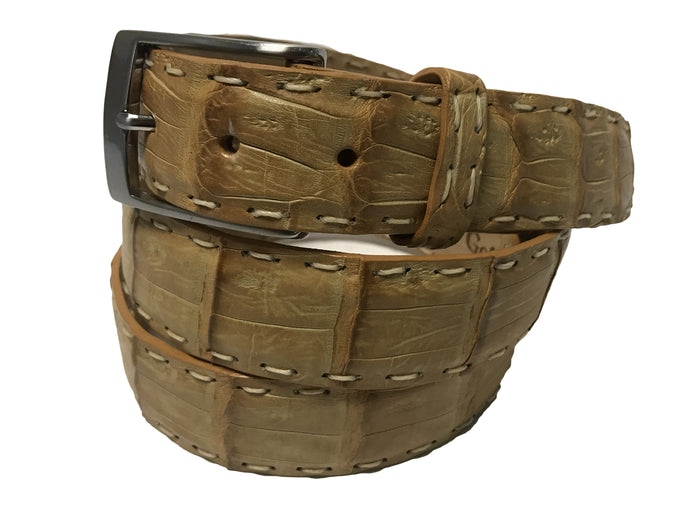 Buying an exotic skin item, like a true caiman skin belt, is a statement. It’s an invest...